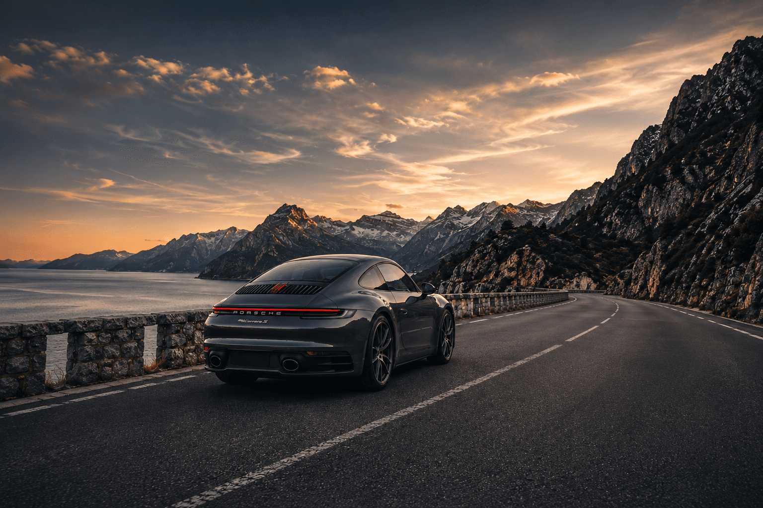 Luxury car parked on a mountain road